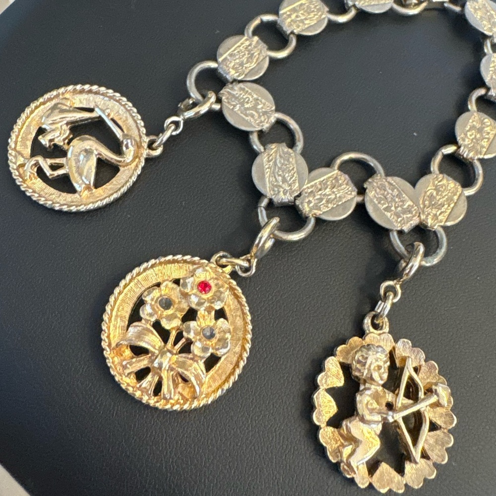 Sarah Cov Coventry vintage charm bracelet stork baby angel bow and arrow flower